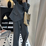 model wearing 2 piece pant suit