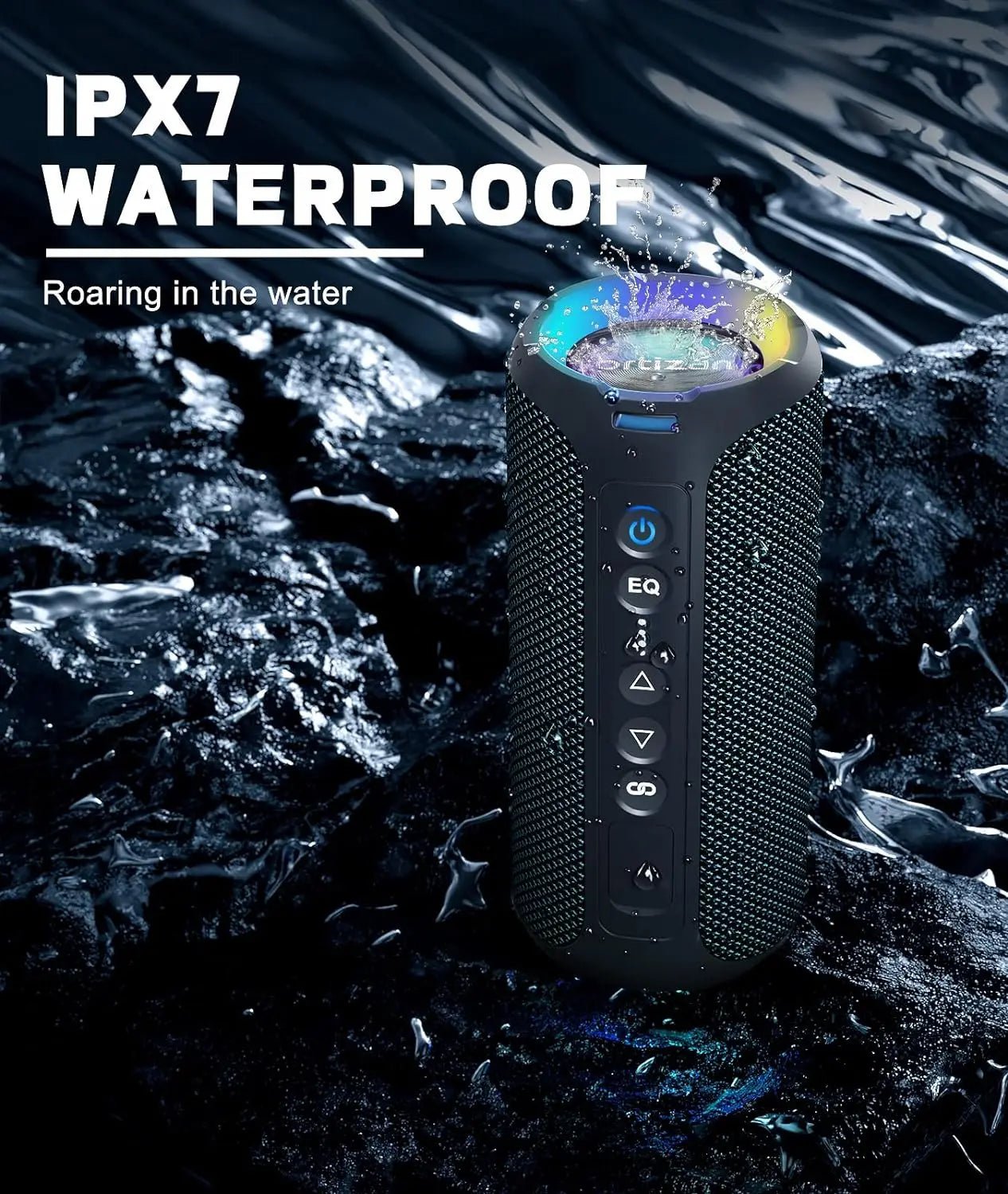 Waterproof portable speaker with IPX7 rating on a rocky surface with water.
