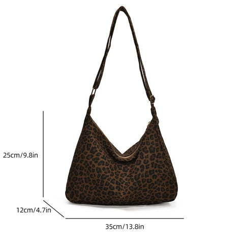 Leopard print handbag with measurements on a white background