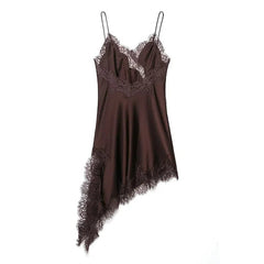 Brown slip dress with lace details on a white background