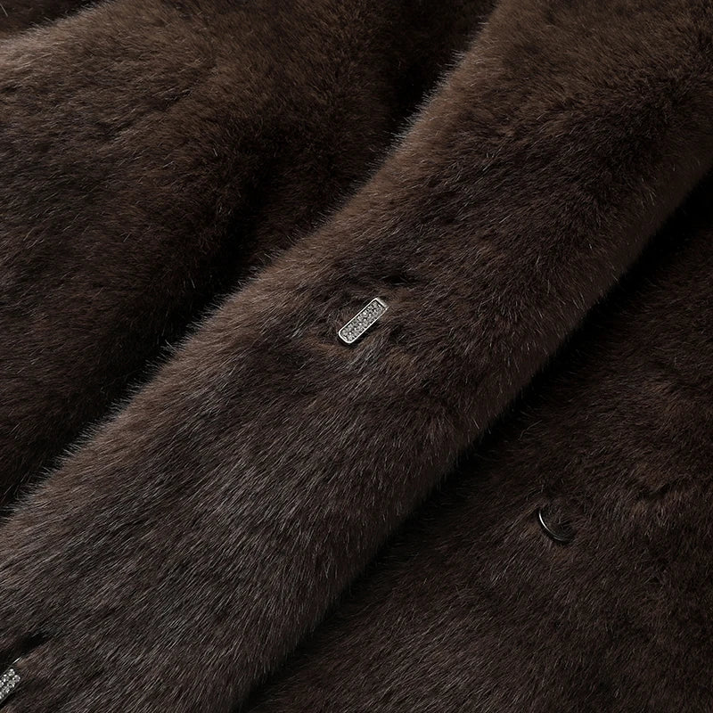 Close-up of a brown fur coat with a brand label.
