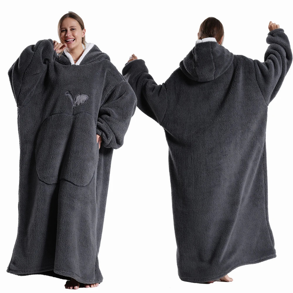 Person wearing a gray fleece blanket with hood and bear ears, shown from front and back.