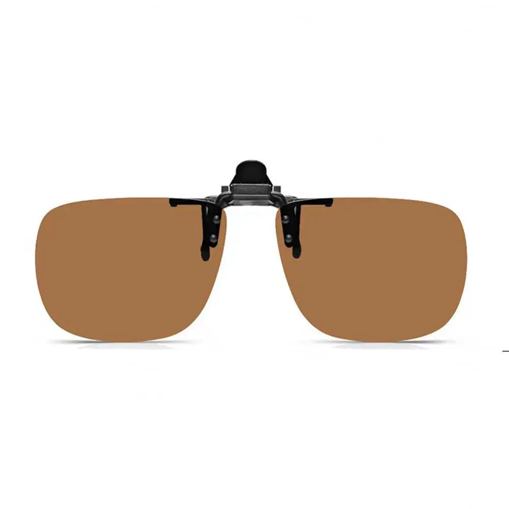 Brown sunglasses with a black clip on a white background