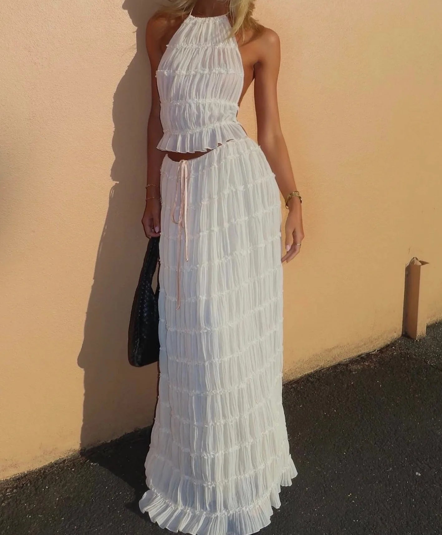 Elegant 2 Piece Set White Halter Pleated Maxi Dress with Tiered Layers and Adjustable Waist Belt & Backless Sling Top Long Skirt Suit