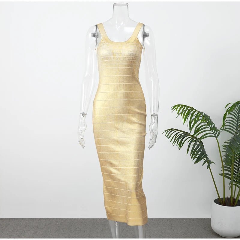 Gold dress on a mannequin with a plant in the background