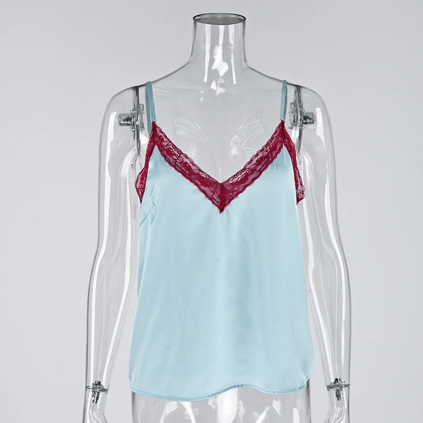 Light blue camisole with red lace trim on a mannequin against a gray background