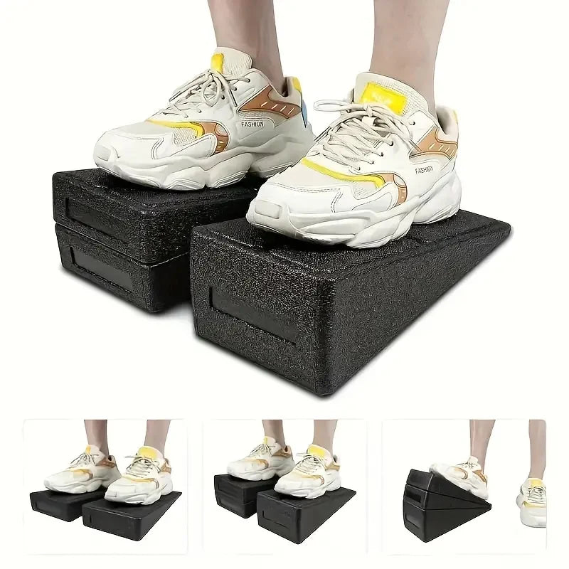 Black step platforms with white sneakers on a white background