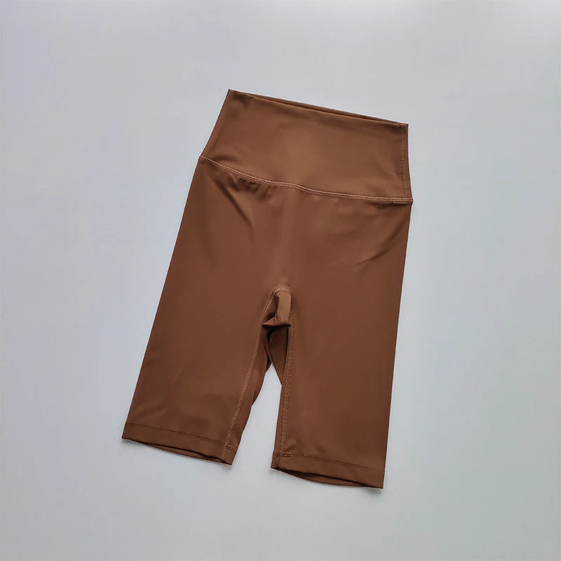 Brown shorts on a light gray background