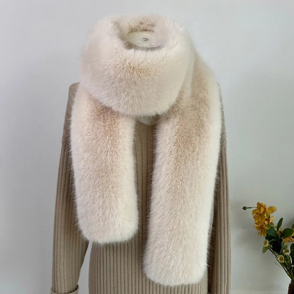 Beige fur scarf draped over a beige coat with a white background