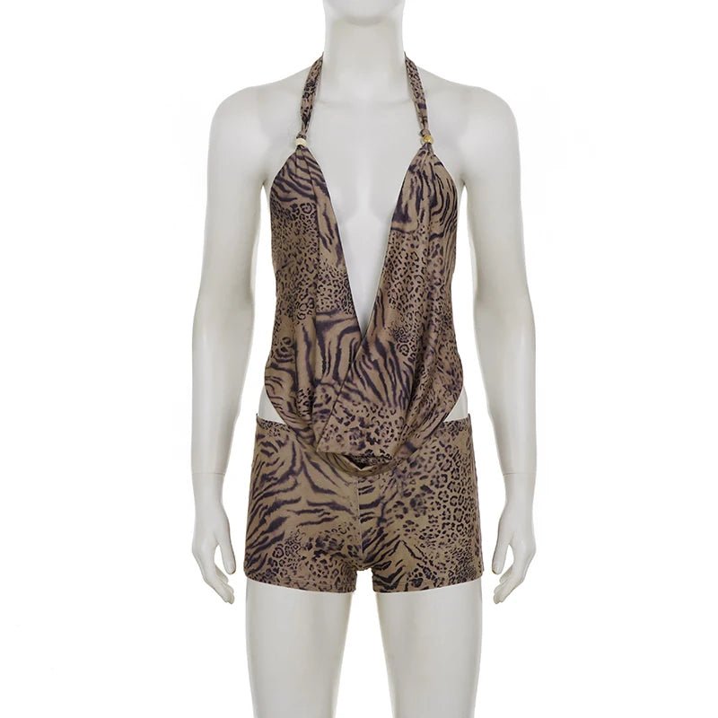 Mannequin wearing a leopard print halter top and shorts on a white background