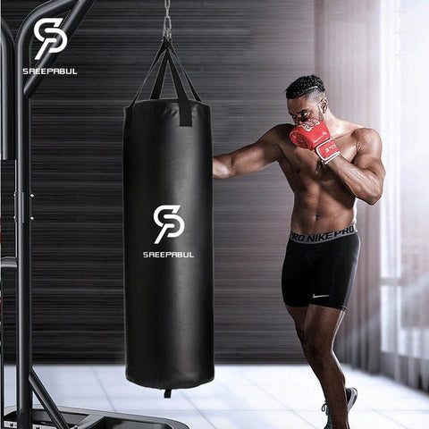 Man in boxing stance with a punching bag branded 'Saeepabul' in a gym setting.