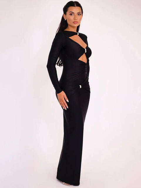 Woman wearing a black evening gown with cut-out design on a white background