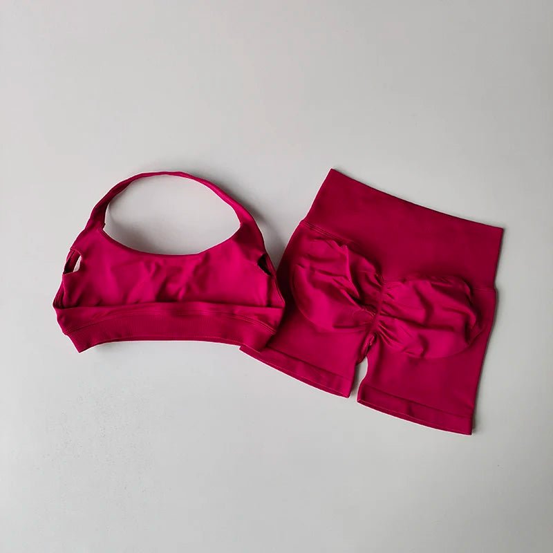 Pink bikini set on a light gray background