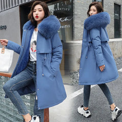 Long padded winter parka for women with big faux fur hood and drawstring waist