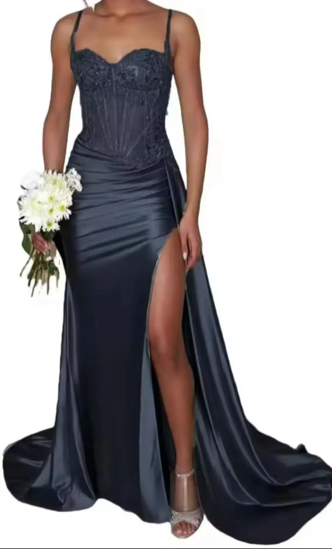 Navy blue evening gown with a high slit on a white background