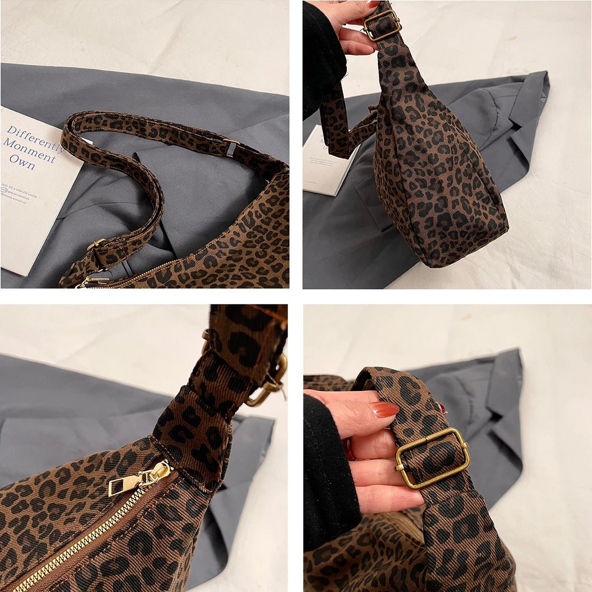 Leopard print bag with gold buckle and zipper on a gray surface.