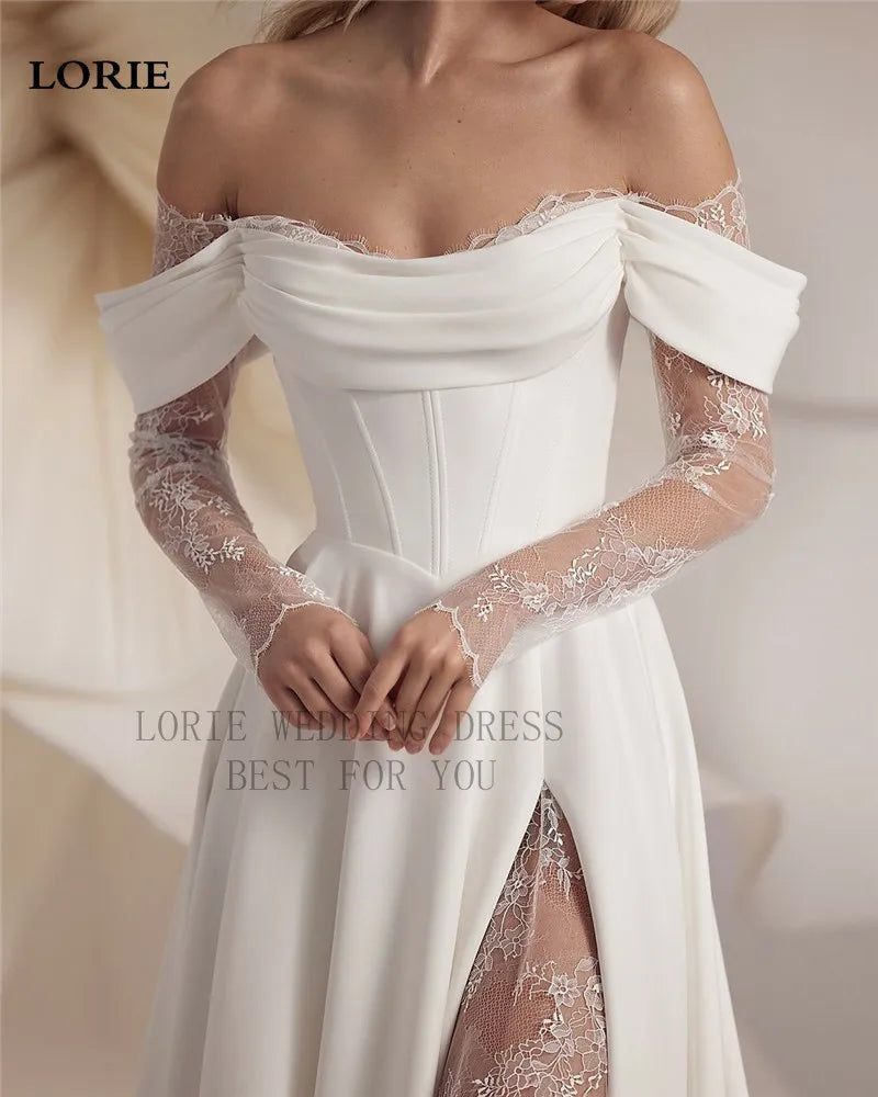 White wedding dress with lace sleeves and a slit on a neutral background, featuring the brand 'LORIE'.