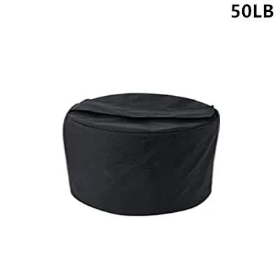 Black round object with a cover on a white background, labeled '50LB'.
