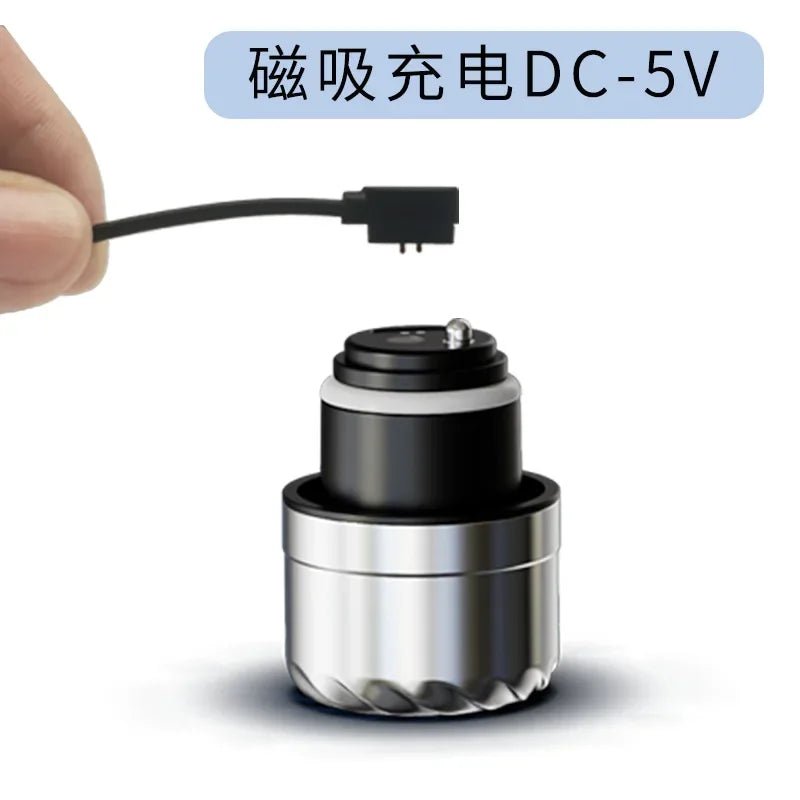 Black and silver cylindrical device with a cable, on a white background