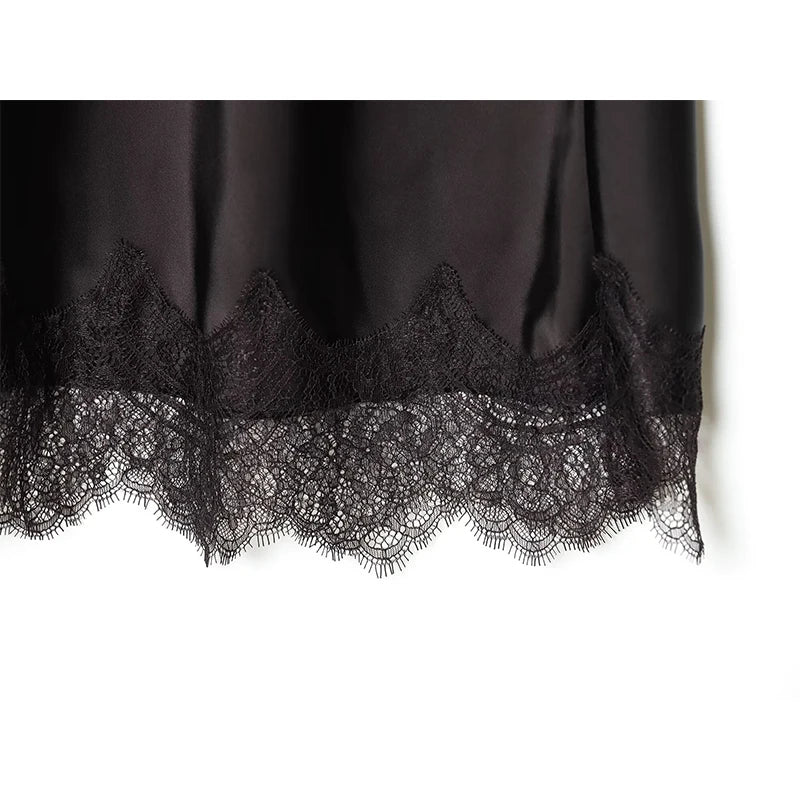 Black lace trim on a plain background