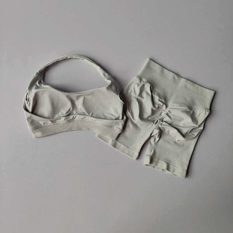 Light gray bra and panties set on a gray background