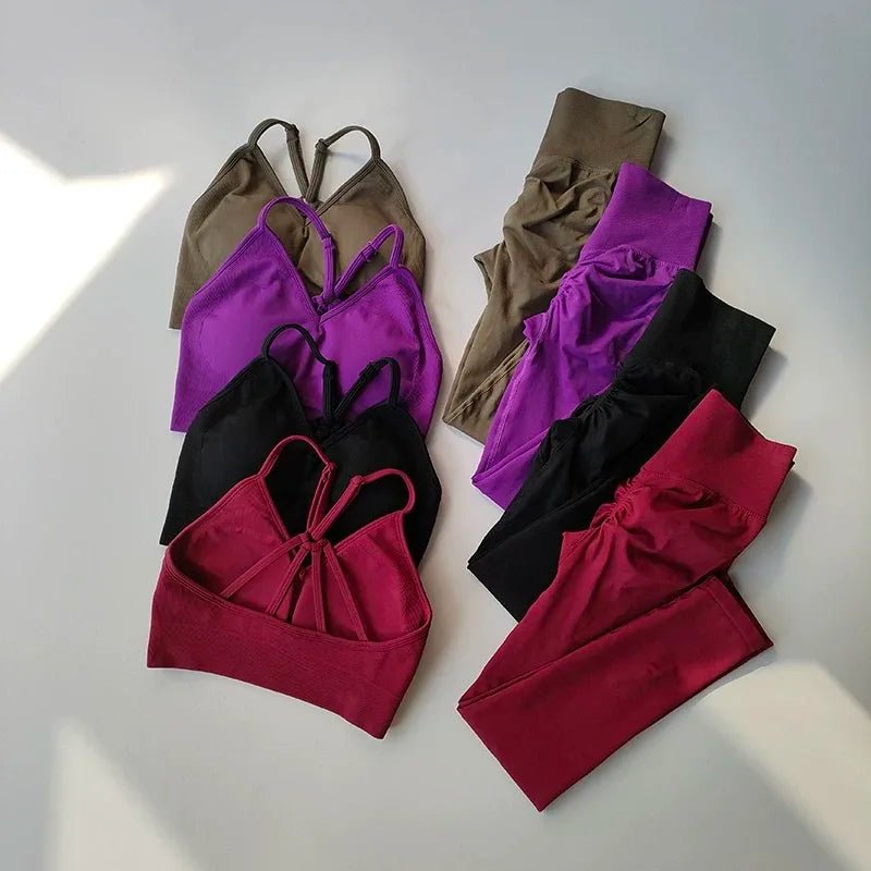 Set of women's tops in purple, brown, black, and red on a light gray background