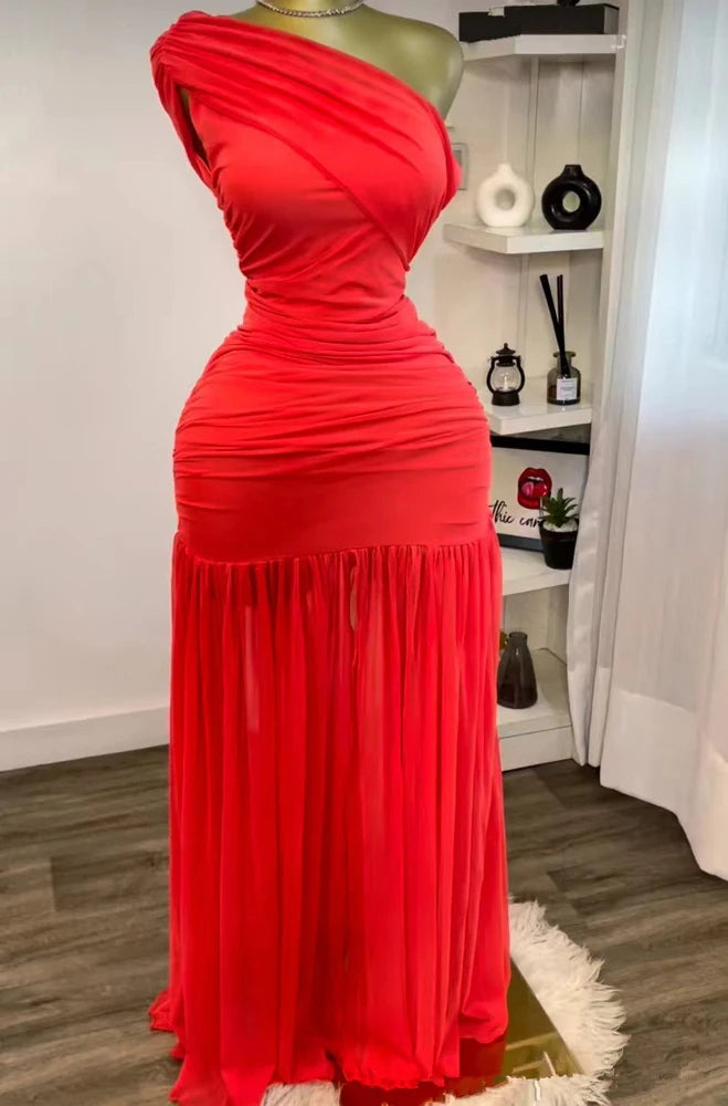 Red one-shoulder dress on a mannequin against a neutral background