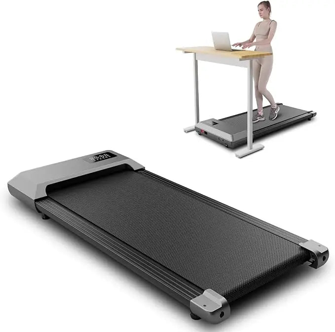 Treadmill with a person using a laptop on a standing desk.