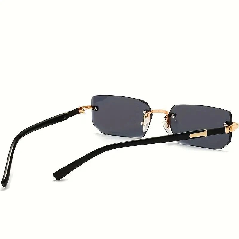 Sunglasses with black frames and dark lenses on a white background