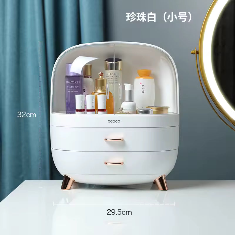 White cosmetic organizer with skincare products on a gray surface, with measurements indicated.