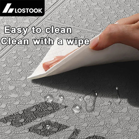 Person cleaning a surface with a wipe, text 'Easy to clean Clean with a wipe' and brand 'LOSTOOK' displayed.