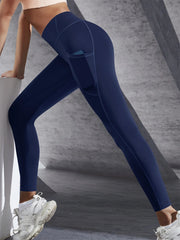 Person wearing blue leggings with a blurred background