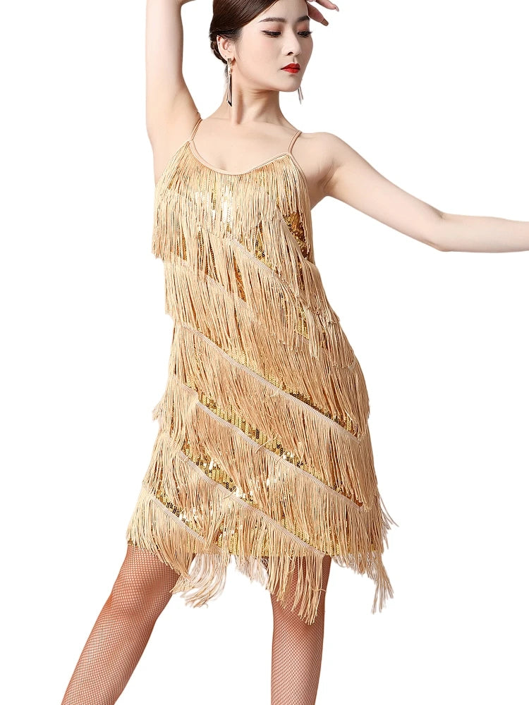 Woman wearing a beige fringe dress on a white background