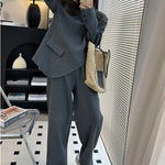 model wearing 2 piece pant suit 