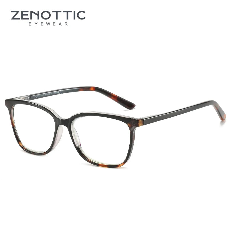 Eyeglasses with tortoiseshell accents on a white background, branded as Zenottic Eyewear.