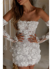White lace dress with long sleeves worn by a model indoors.
