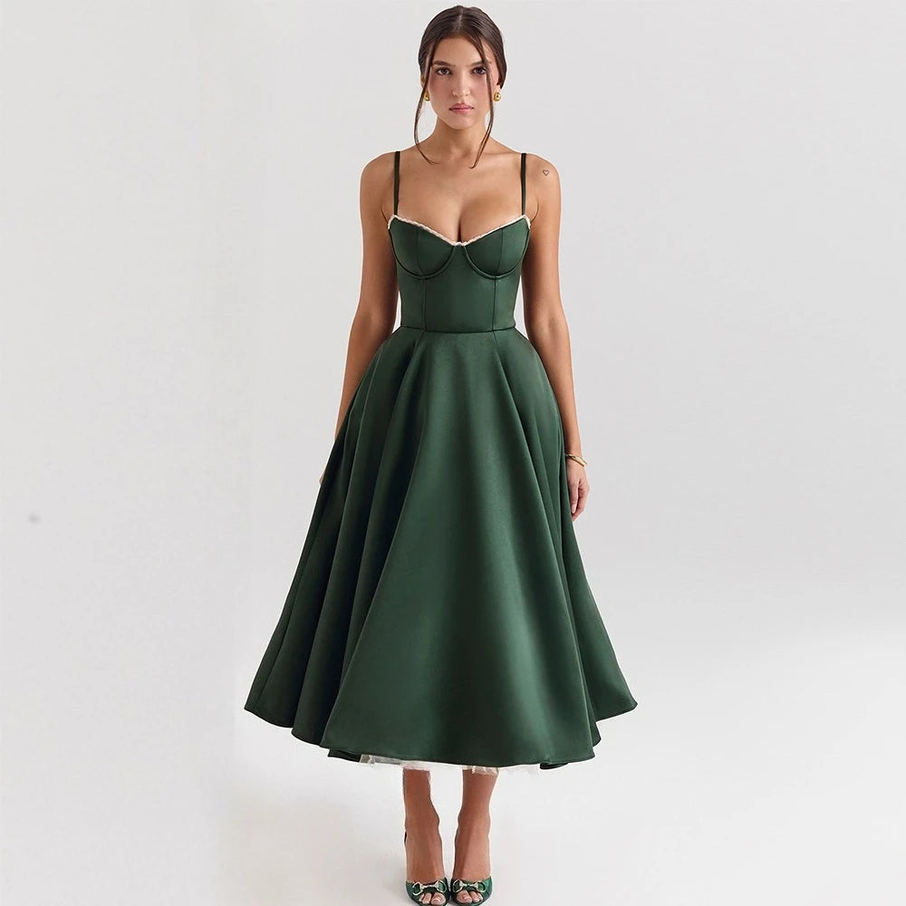 Woman wearing a green dress on a white background
