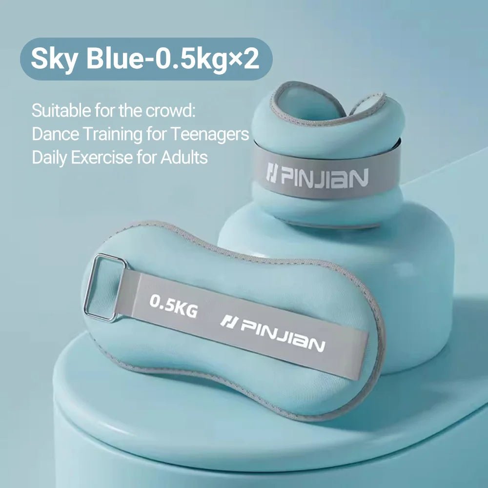 Two sky blue wrist and ankle weights   with gray straps on a light blue background, featuring the brand 'PINJIAN'.