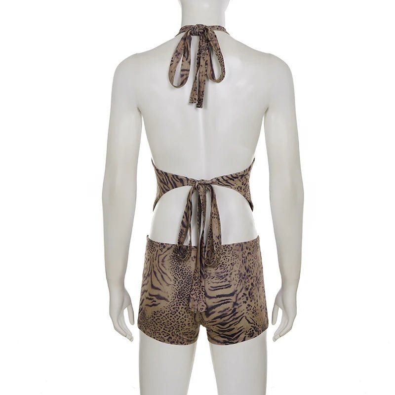 Mannequin wearing a leopard print halter top and shorts set on a white background