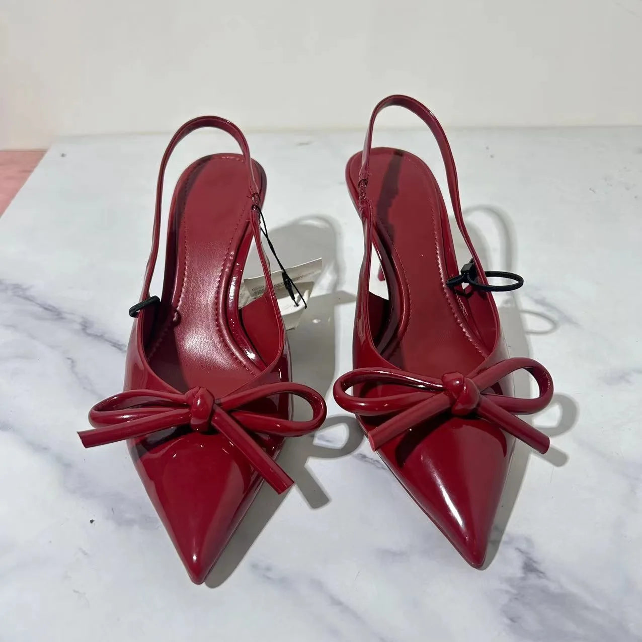 Red Patent Leather Pointed-Toe Slingback Heels with Bow – Chic & Elegant