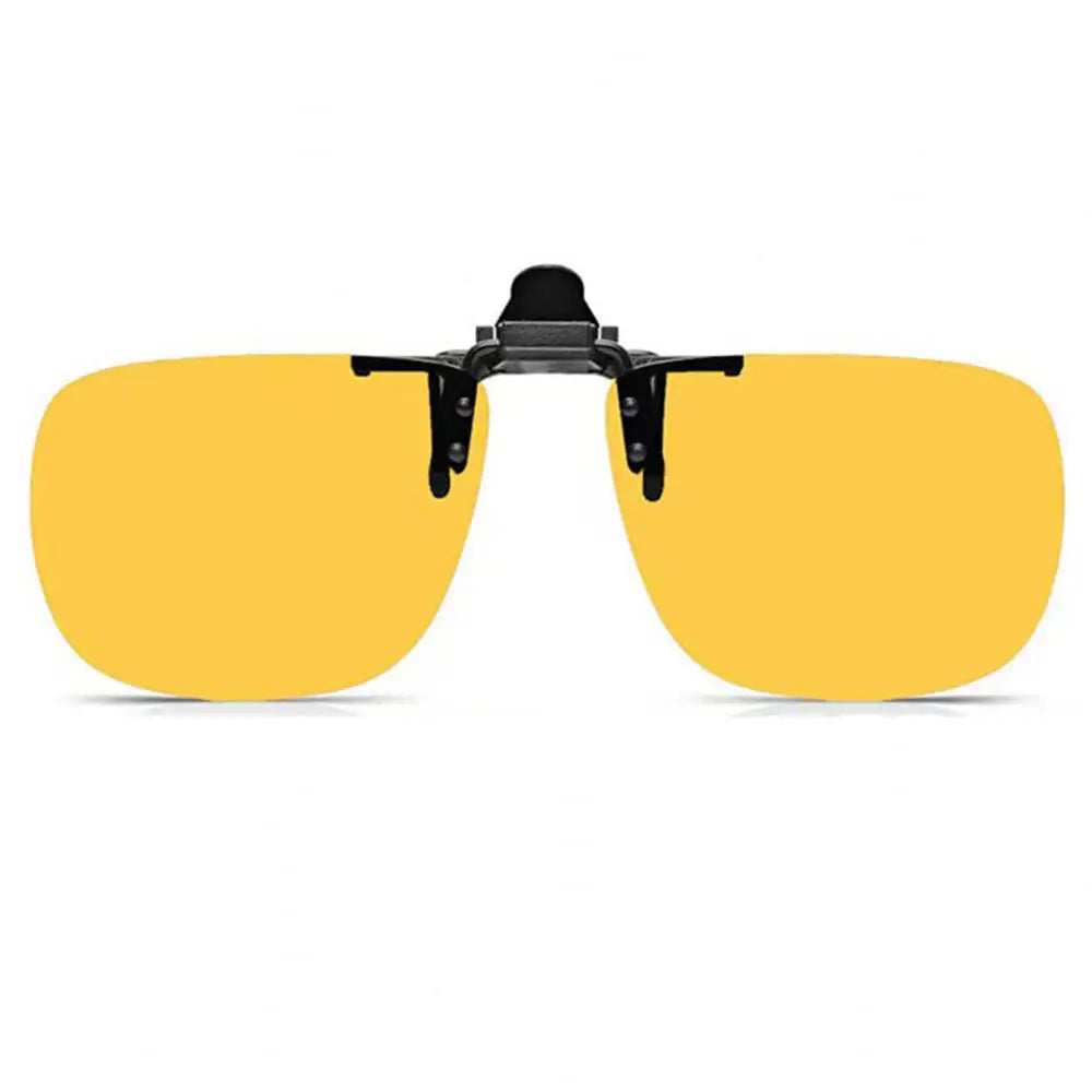 Yellow sunglasses with a black clip on a white background