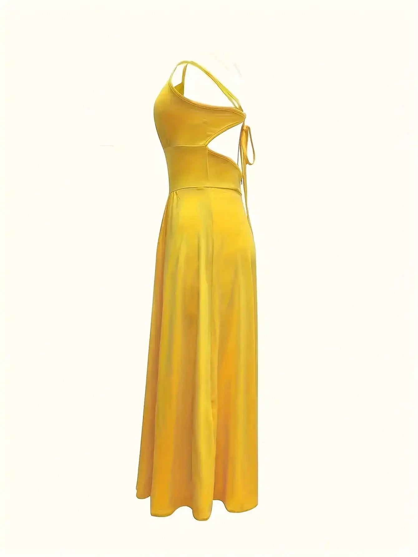 Yellow evening gown with cut-out design on a white background