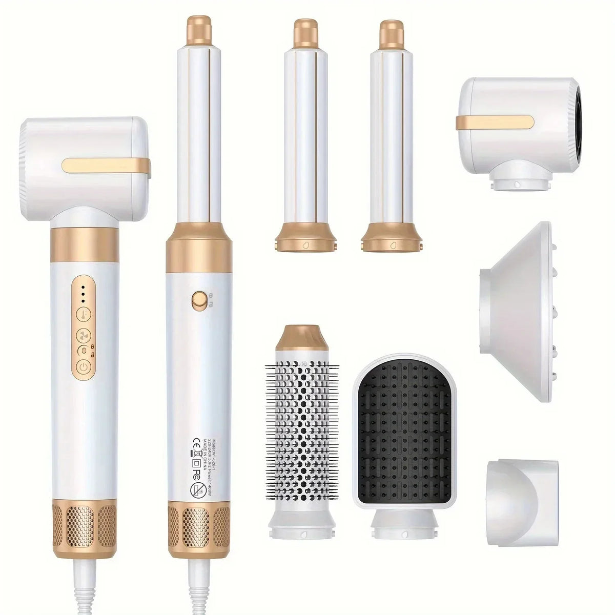 Set of white and gold hair styling tools with various attachments on a white background