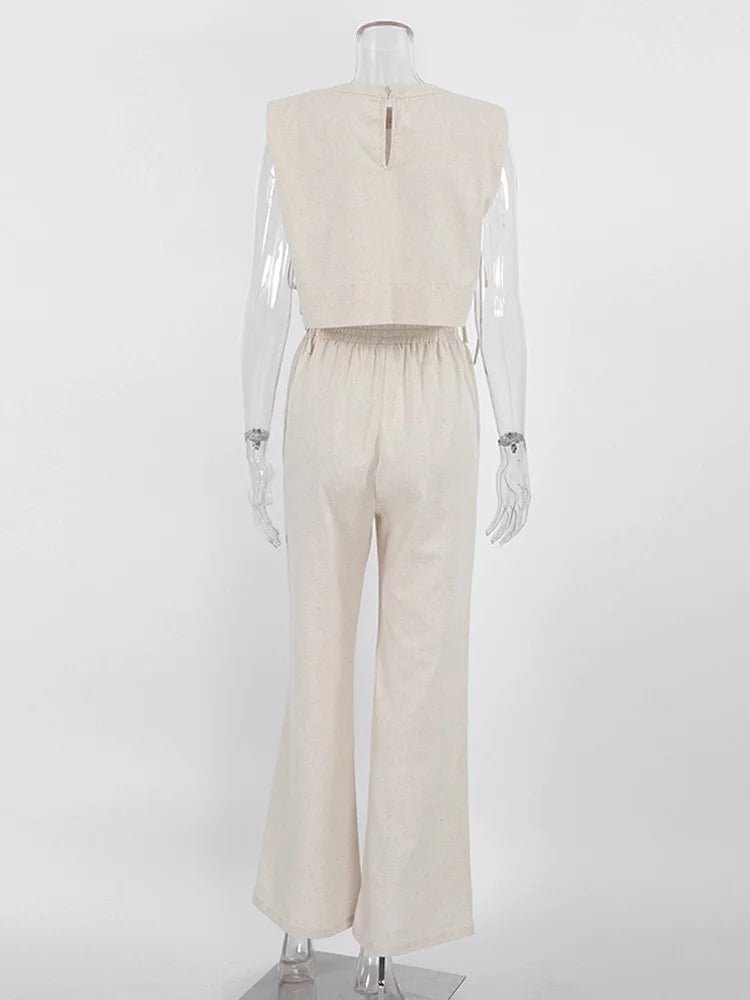 Mannequin wearing a beige sleeveless top and pants on a white background