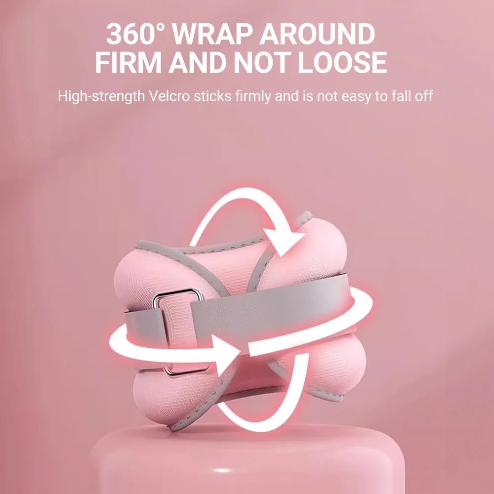 Pink wrist and ankle weights with Velcro strap on a pink background, emphasizing firm attachment.