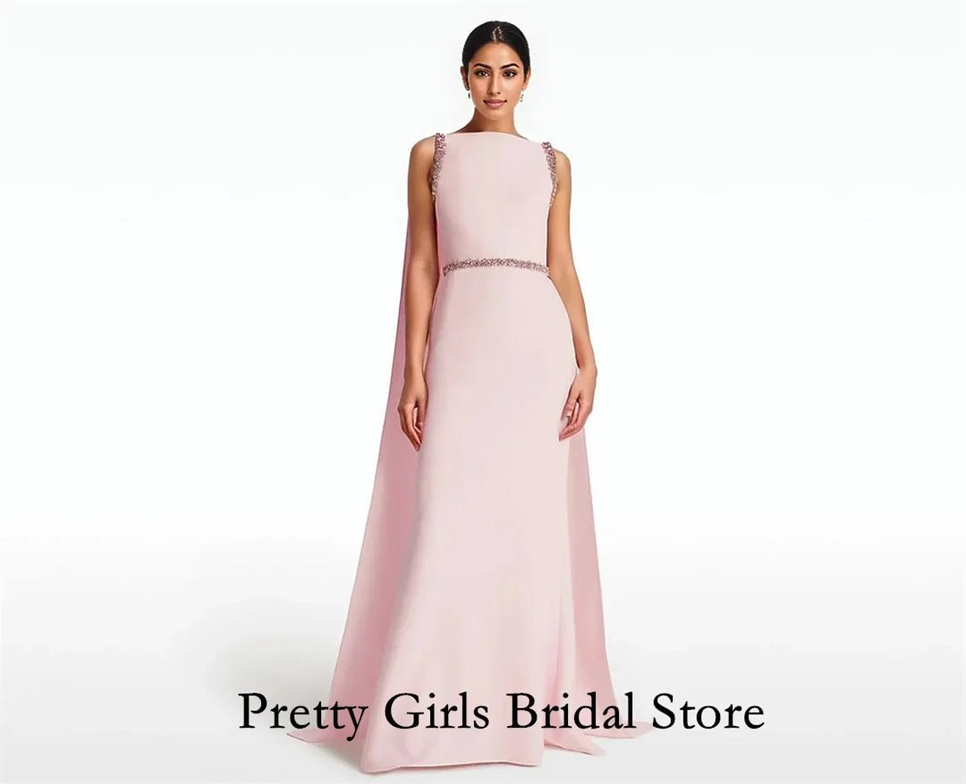Pink evening gown on a white background with 'Pretty Girls Bridal Store' text.