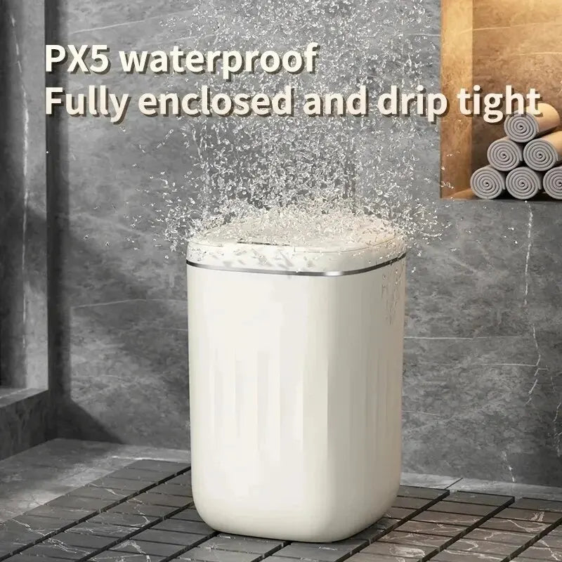 White waterproof trash can with water splashing around it in a bathroom setting.