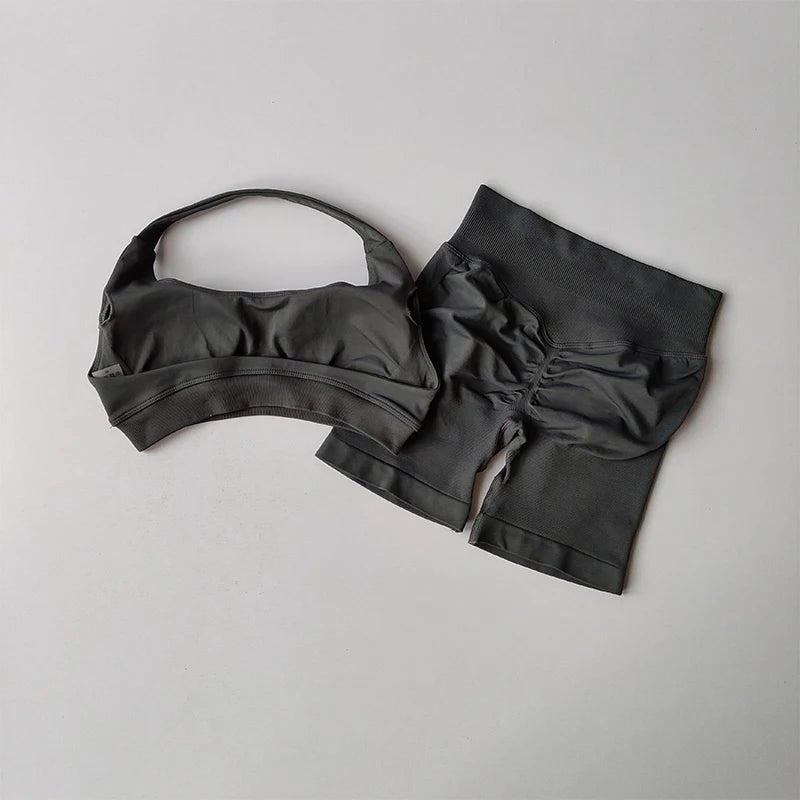 Black bikini set on a light gray background
