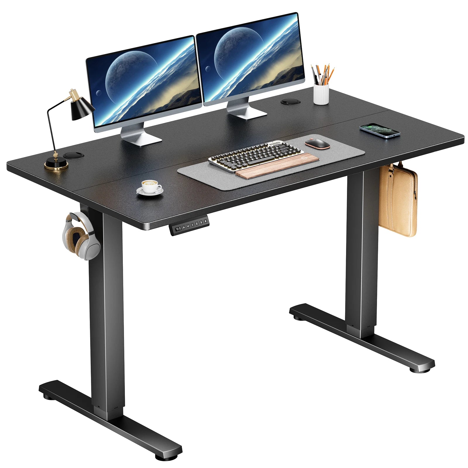 Black computer desk with multiple monitors, keyboard, and office items on a white background