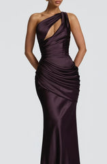 Elegant one-shoulder purple gown on a plain background